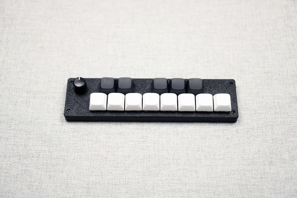 The 13KS-1ES seen from the front, the whole one-octave layout sitting in one slim black body