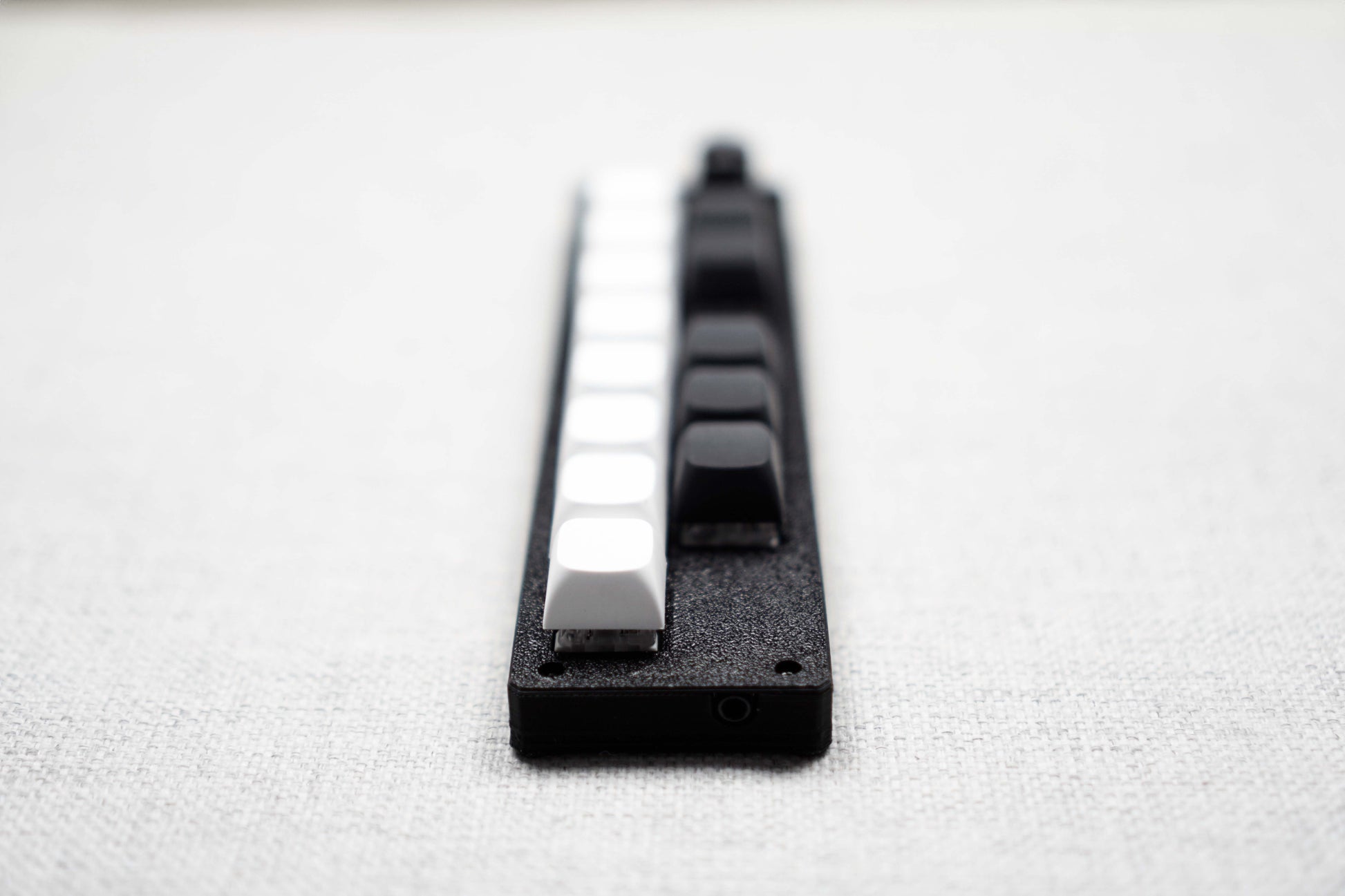 The 13KS-1ES seen end-on, showing how low the body sits on the desk